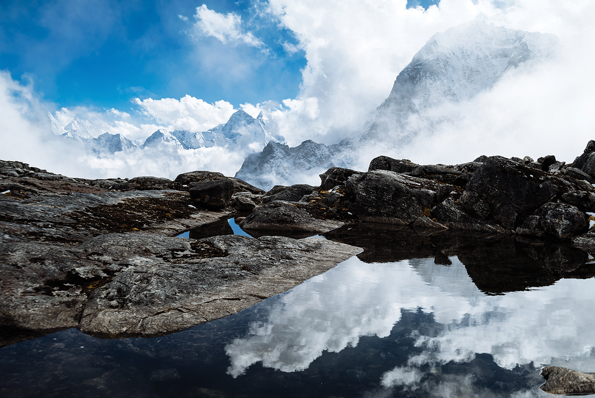 Rocky summit with fresh water mountain lake
